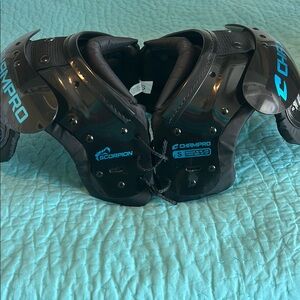 Champro Scorpion Football Shoulder Pads Black and Blue